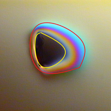 "Pinhole under a microscope with DIC optics"