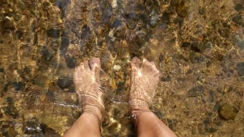 Feet in creek, wavefront